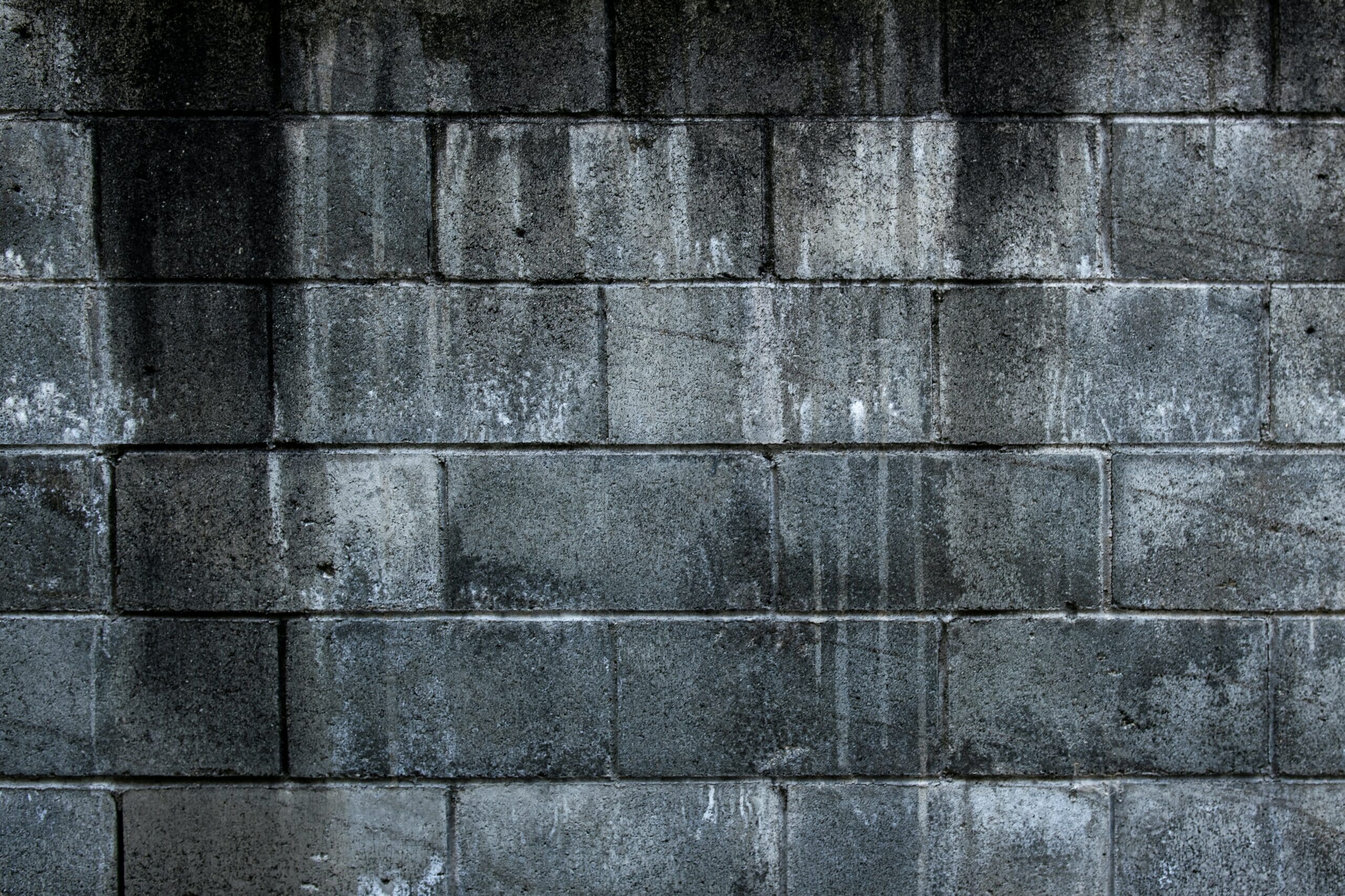 gray brick wall during daytime